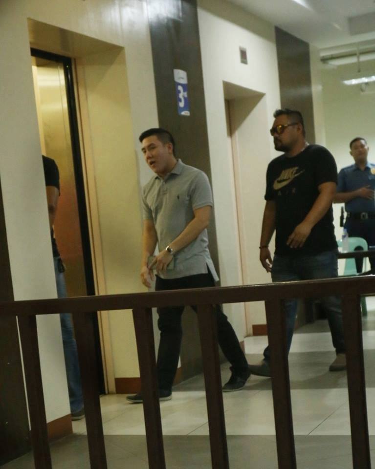 David Lim Jr left after its arraignment for frustrated homicide is resit together with his body guard (CDN PHOTO by Junjie Mendoza) 