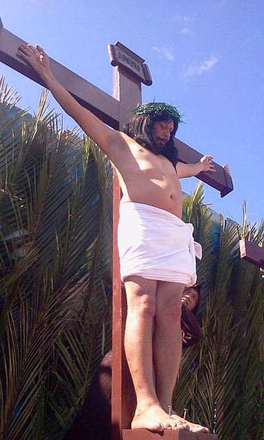 Gilbert Bargayo had himself nailed on the cross on Good Friday for the fifth time in Tuburan town and in front of local and foreign tourists. (CDN PHOTO/NORMAN MENDOZA)