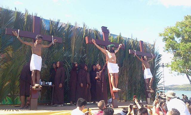 Gilbert Bargayo had himself nailed on the cross on Good Friday for the fifth time in Tuburan town and in front of local and foreign tourists. (CDN PHOTO/NORMAN MENDOZA)