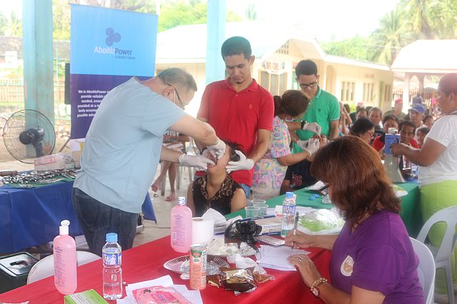 Residents of three barangays in Toledo City receive free medical and dental services from AboitizPower. (CONTRIBUTED PHOTO)