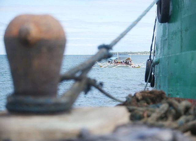 There were motorbancas that continue to ferry passengers from Barangay Talisay in Santa Fe. (CDN PHOTO/LITO TECSON)