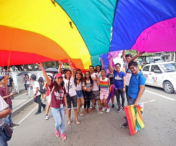 The group UP Pride supports the Lesbian, Gay, Bisexual Transgender and Queer community in a walk from Gorordo Avenue to the Capitol ground. CDN PHOTO/LITO TECSON