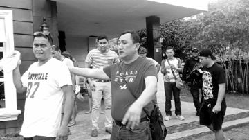 lagtang Barangay Captain Mark Ferdinand Bas is shown here being escorted by police operatives following his arrest last Easter Sunday. CONTRIBUTED PHOTO