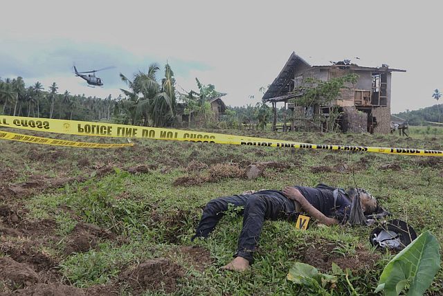 The Armed Forces of the Philippines (AFP) says that this man slain by soldiers during a clash with the Abu Sayyaf in Barangay Napo, Inabanga, Bohol is Muamar Askali, alias Abu Rami, a notorious leader of the Islamic militant group who beheaded two Canadian and one German hostages for failing to pay ransom.  (CDN PHOTO/TONEE DESPOJO)