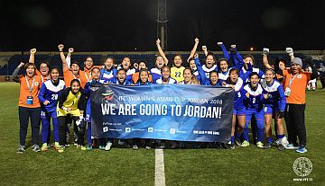 Members of the Philippine women’s football team celebrate after their 1-1 draw with Bahrain. inquirer