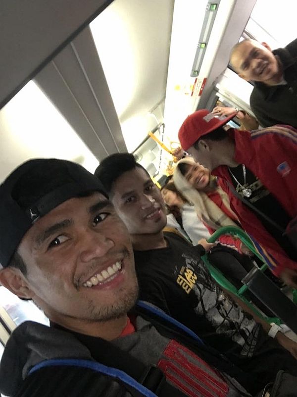SELFIE IN THE LAND OF CHERRY BLOSSOMS. World Boxing Organization (WBO) world bantamweight champion Marlon Tapales (left) takes a selfie with his team upon their arrival in Osaka, Japan yesterday. Tapales will defend his crown this Saturday against Japanese Shohei Omori. /Marlon tapalaes fb page