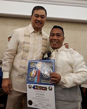 Master Benigno “Ekin” Caniga Jr. along with guest speaker Congressman Monsour Del Rosario during the awards night. /CONTRIBUTED PHOTO