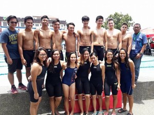 Central Visayas’ men's and women's swimming team with head coach Ronald Manlosa (right most) gather after winning the overall title in the swimming competition of the National Prisaa yesterday in Iba, Zambales. (Contributed)
