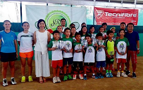 Naga City Mayor Kristine Vanessa Chiong (3rd from left) and tournament director Fritz Tabora pose with the winners in the JRG Tennis Cup at the Naga City Tennis Club. CONTRIBUTED PHOTO
