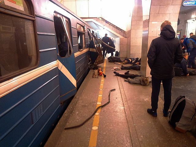 Blast victims lie near a subway train hit by an explosion at the Tekhnologichesky Institut subway station in St.Petersburg, Russia. (AP)