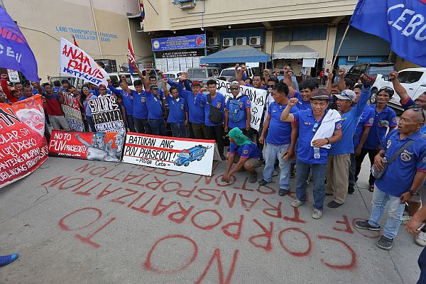 Drivers converged at the LTFRB - 7 office in Cebu City to express their dismay on the planned modernization of public transportation in the country. /Junjie Mendoza