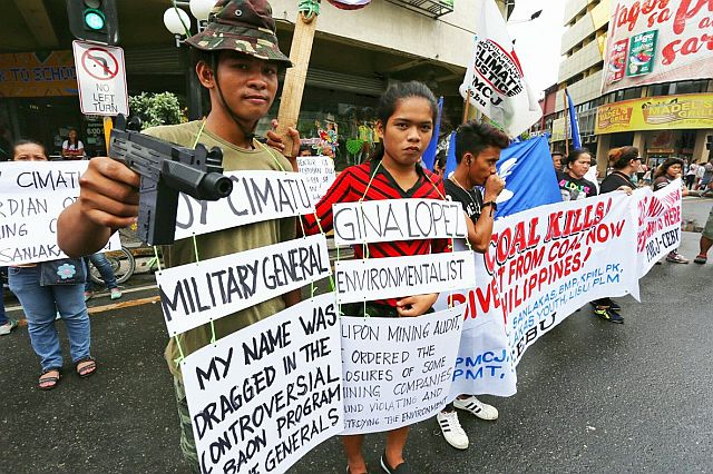 Militant groups gather at downtown Cebu City opposing coal-fired power plant and the appointment of new DENR Secretary (CDN PHOTO/ JUNJIE MENDOZA)