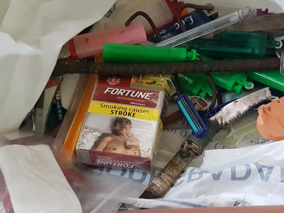 Personnel of the Bureau of Jail Management and penology recovered mobile phone, bottle of Nubian and assorted drug paraphernalia including bladed weapons during their Greyhound operation today, Friday dawn. (PHOTO GRABBED FROM CEBU CITY COUNCILOR DAVE TUMULAK)