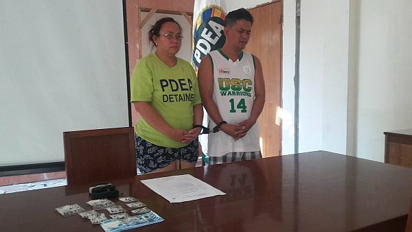 Spouses Erick and Jorel Lauron are presented to the media by the Philippine Drug Enforcement Agency in Central Visayas (PDEA-7) after they were arrested at dawn on Friday, May 19, 2017, in Espolarium St., Barangay Duljo Fatima, Cebu City in a buy-bust operation that yielded drugs worth over P500,000. (see breaking news item on CDN website and Facebook page) 