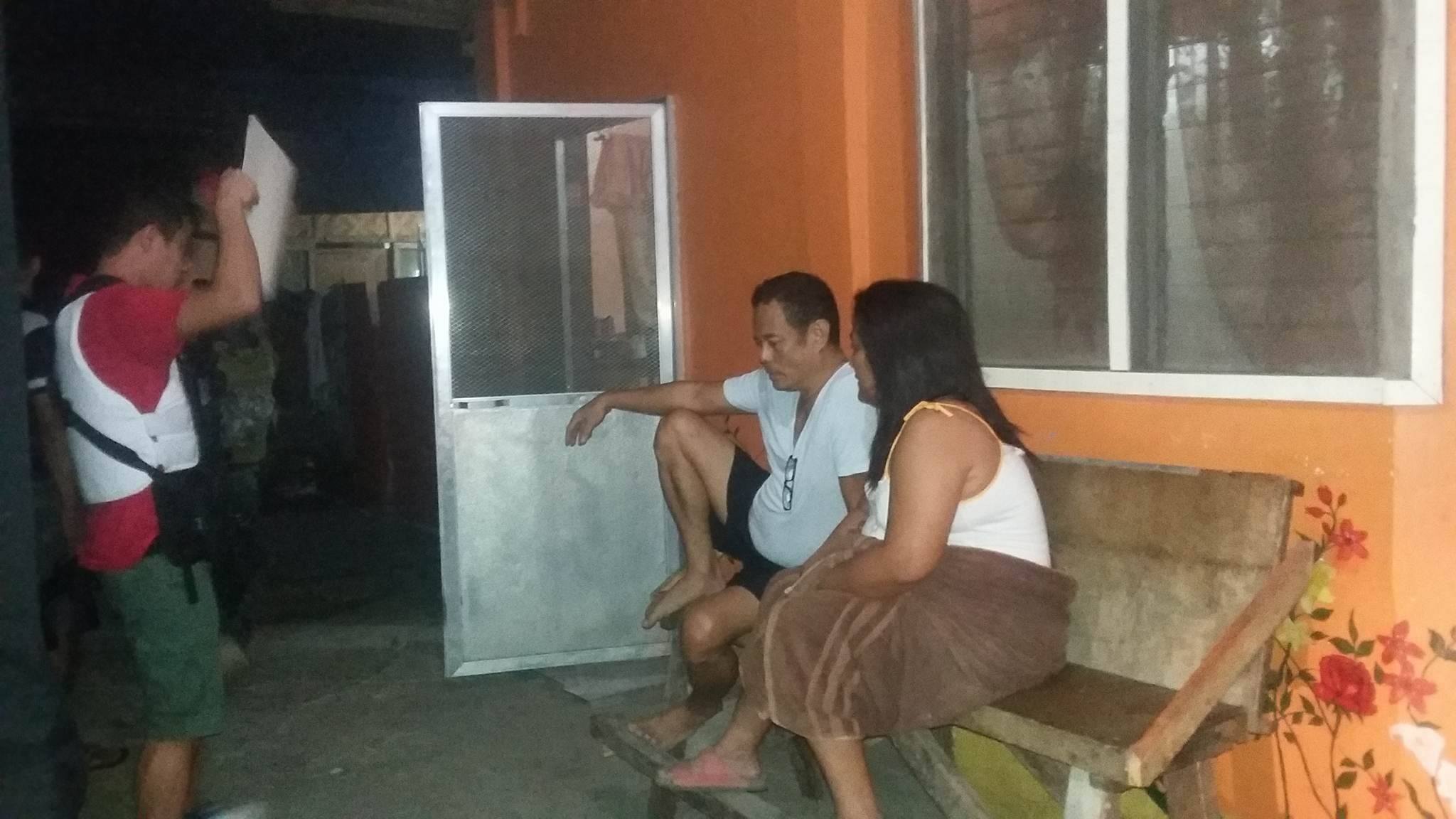 Operatives from the Cebu Provincial Police Office  raided the house of police couple on Sibonga town, early morning Tuesday. (CDN PHOTO/ BENJIE TALISIC)