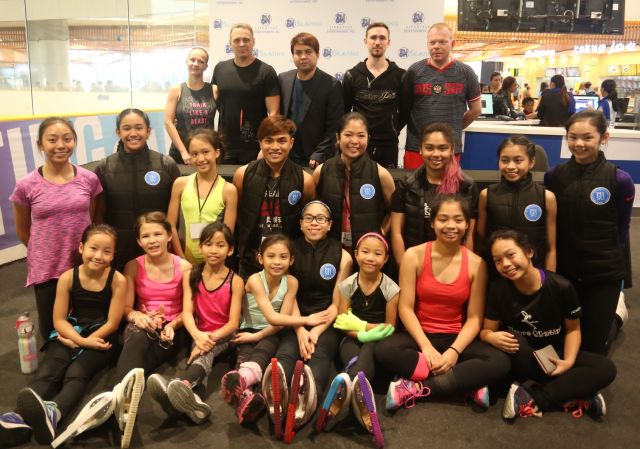 The coaches with the participants of the 10-day figure skating camp posed for a photo opportunity after a press conference  at the SM Seaside ice rink (CDN PHOTO/ Lito Tecson)