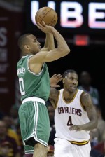Boston's Avery Bradley shoots over Iman Shumpert pf Cleveland in Game 3 of the East Finals. /Ap photo