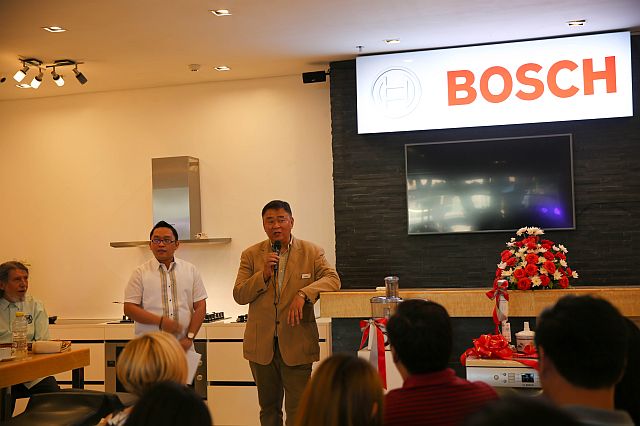 Efren Reyes, sales manager, kitchen and appliance division of Hafele Philippnes Inc., answers questions from the media during the Bosch store opening at the Design Center Cebu. (CDN PHOTO/CRIS EVERT LATO RUFFOLO)