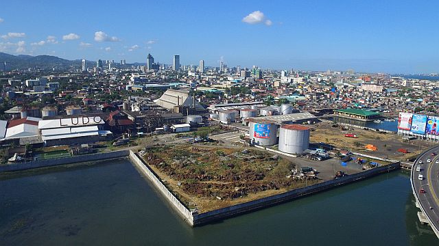 An aerial shot of LUDO Corp. in Barangay Sawang Calero, where the coal plant project is said to be built, is located within a major population center.  CDN File Photo