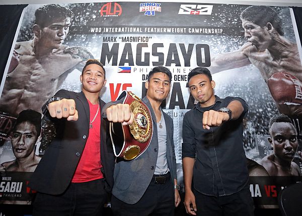 From left, Prince Albert Pagara, Mark "Magnifico" Magsayo and Jeo "Santino" Santisima gather after a press conference for the Pinoy Pride 41 at the Radisson Blu Hotel at the North Reclamation Area in Cebu City. CDN PHOTO/LITO TECSON