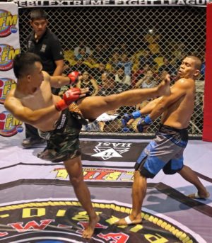 In this February 2017 photo, Roel “Akiyama” Rosauro (left) competes in the Cebu Extreme Fight League at the Cebu Coliseum. CDN file
