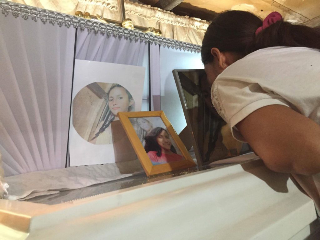 Lourdes Silawan plants a kiss on the photo of placed on top of the coffin of her daughter Christine Lee on he night of her wake on Sunday, March 17, 2019, hours after learning that a key suspect in her child's gruesome murder has been arrested. |CDND Photo/Paul Lauro