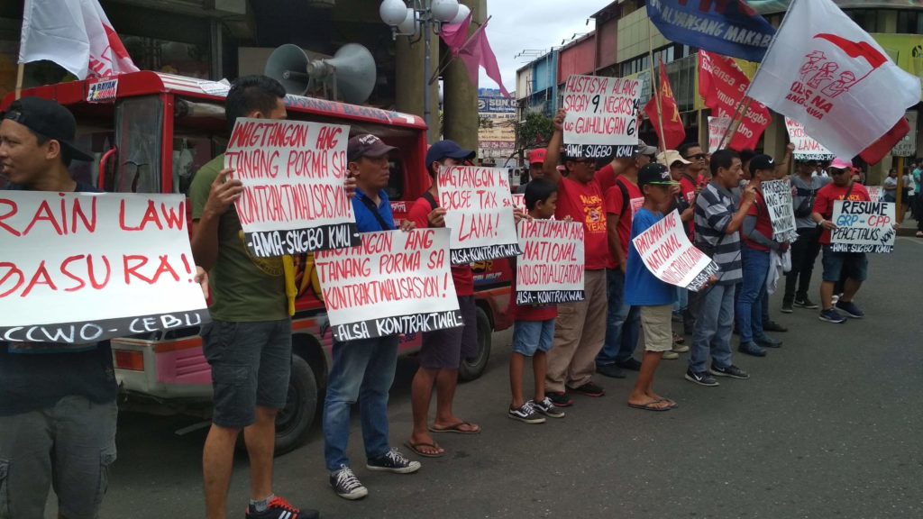 Labor groups in Cebu participate in a protest rally against the Train law and contractualization in the Philippines. | CDND Photo / Gerard Vincent Francisco