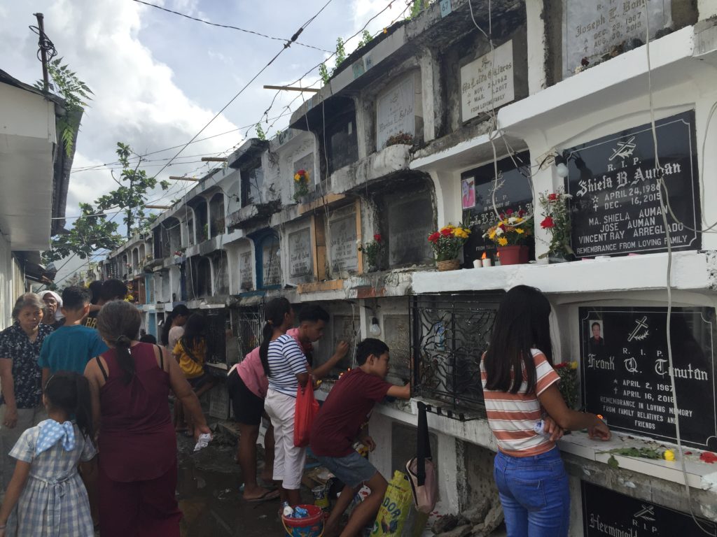 ALL SAINTS DAY AND ALL SOULS DAY: WHY THEY ARE CELEBRATED. In photo are visitors seen at the St. Joseph's Roman Catholic Cemetery in Mandaue City at the Kalag-Kalag on November 1, 2019.
