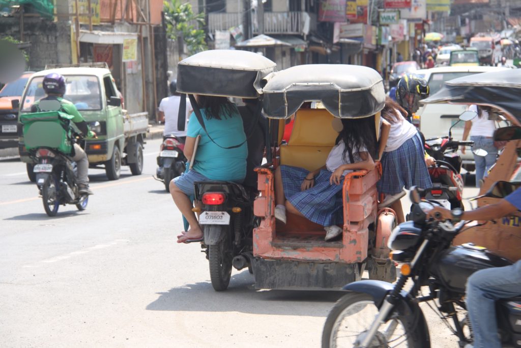 Cuenco to start talks to reduce tricycle fare in Cebu City. In photo is a tricycle plying its route along an interior road in Cebu City. | file photo