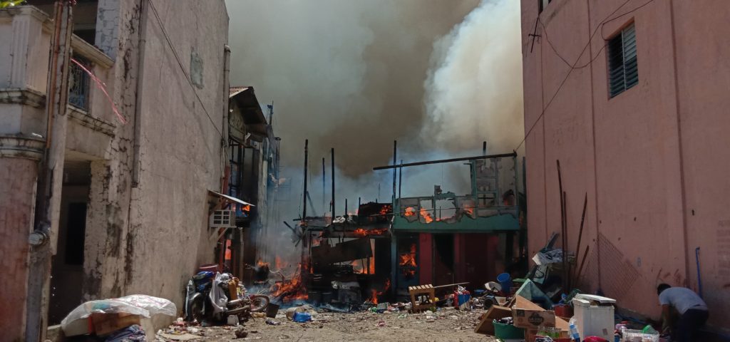 Some of the houses burn during the February 29, 2020 fire that hit two sitios of Barangay Ibabao-Estancia in Mandaue City. | Norman Mendoza