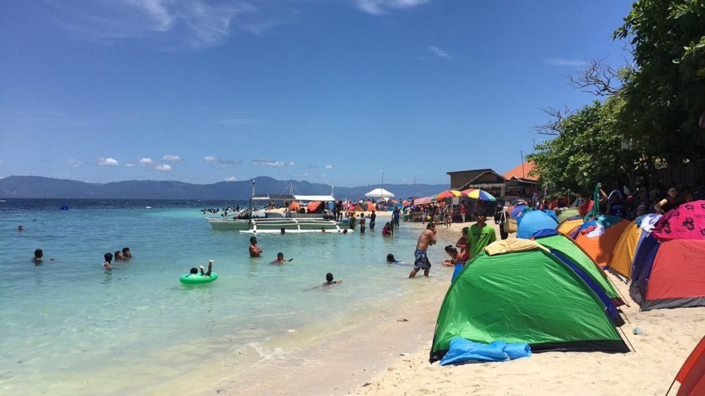 Tents crowd the seaside area of Basdaku Beach in the southern town of Moalboal, Cebu in this 2016 file photo | CDN File Photo