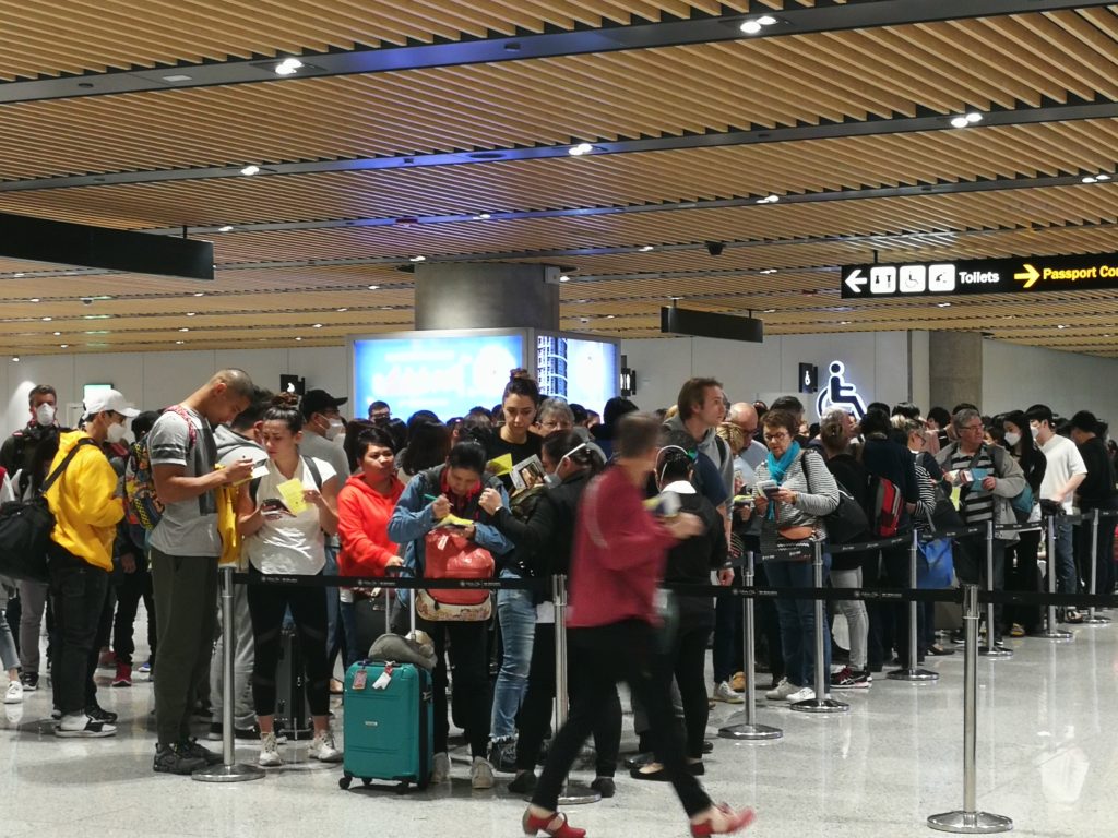 Foreign passengers who arrived at Terminal 2 of MCIA on February 6, 2020 from a long haul flight queue as BOQ personnel examine their health declaration checklist. CDN Digital Photo | Morexette Marie Erram