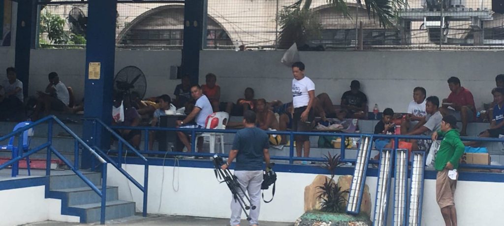 The men arrested for illegal gambling in Barangay Ermita are now occupying the stage area of the Police Regional Office in Central Visayas (PRO-7) compound. | Alven Marie Timting