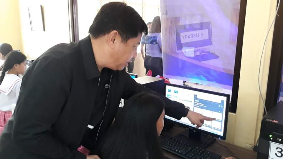 Lapu-Lapu City Mayor Junard Chan checks out the new computers at the e-Library in Olango Island during its opening on Monday, March 9 at the MIni-City Hall in Barangay Talima. | Norman V. Mendoza