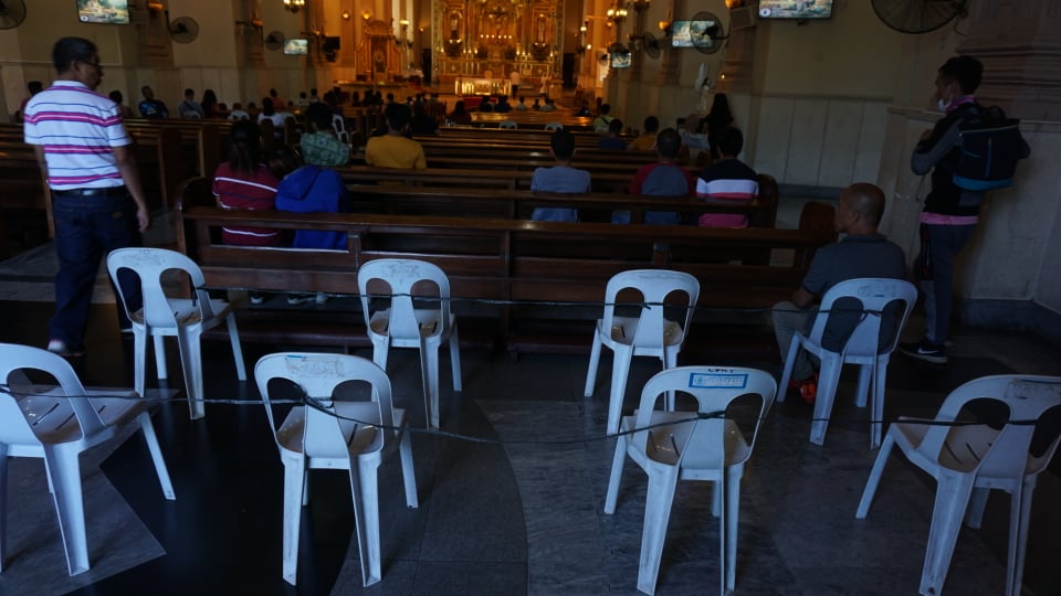 Chairs and pews in the Cebu Metropolitan Cathedral are tied up with black straw for social distancing between churchgoers during masses in this February 2020 file photo | CDN Digital Gerard Vincent Francisco