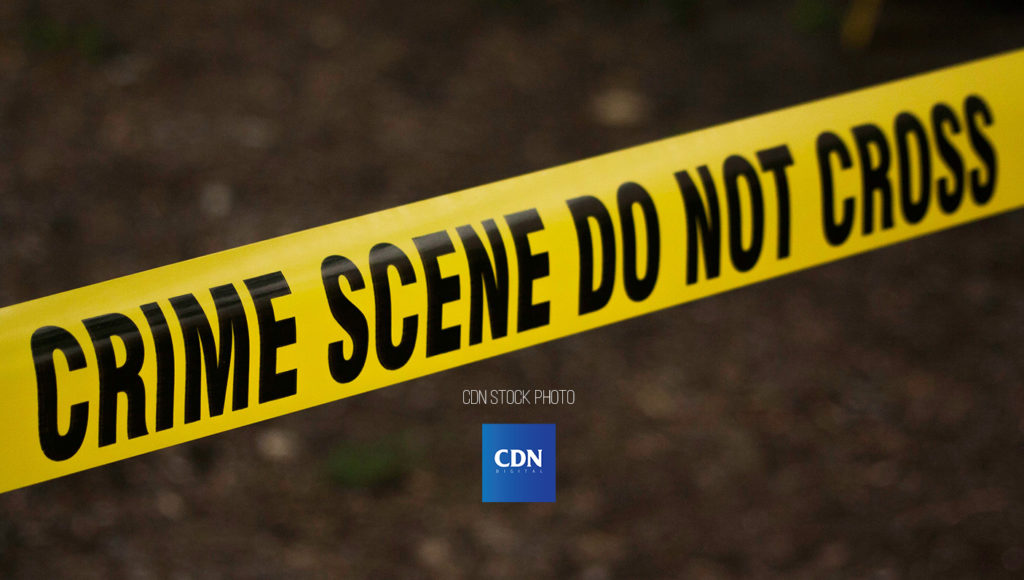 A stock photo of a police tape to cordon a crime scene. 