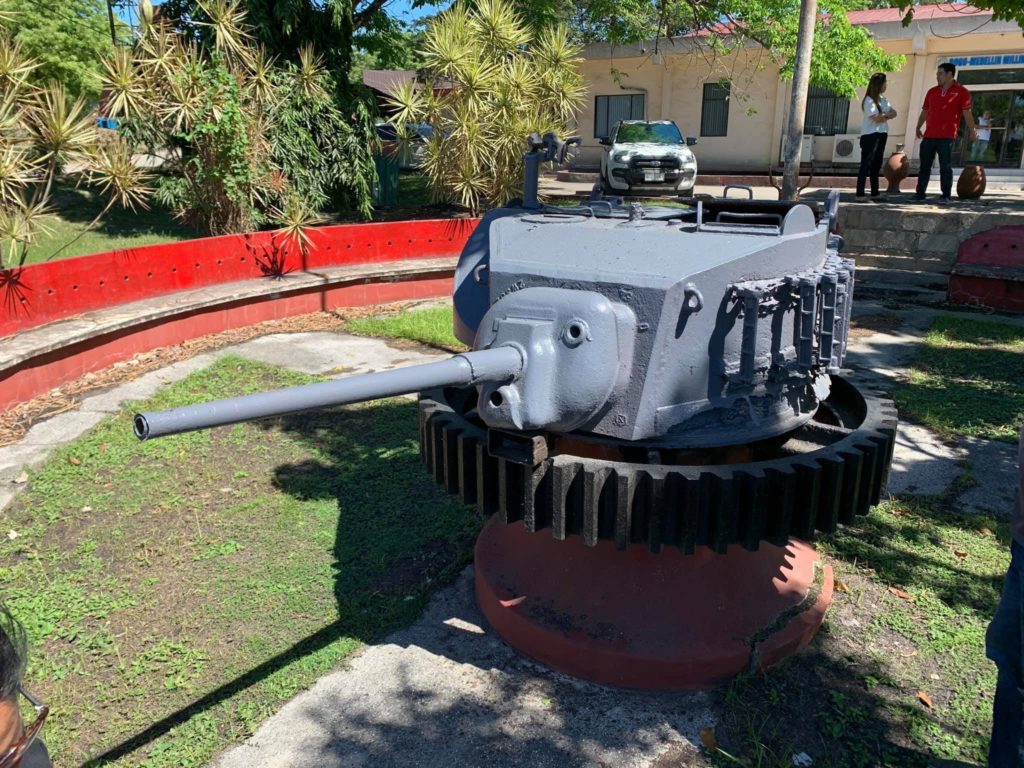 The tank's turret, which has been extracted by Bogo-Medellin Milling Company (Bomedco) in the 1980s, sits as a centerpiece of a mini-circular park at the Bomedco compound. |