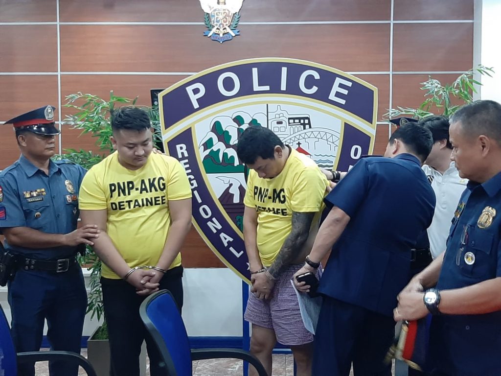 Police present to the media the 2 Chinese nationals, who were arrested on Thursday dawn, March 5, 2020, for allegedly kidnapping three Chinese workers in Barangay Mactan, Lapu-Lapu City. |CDN Digital file photo