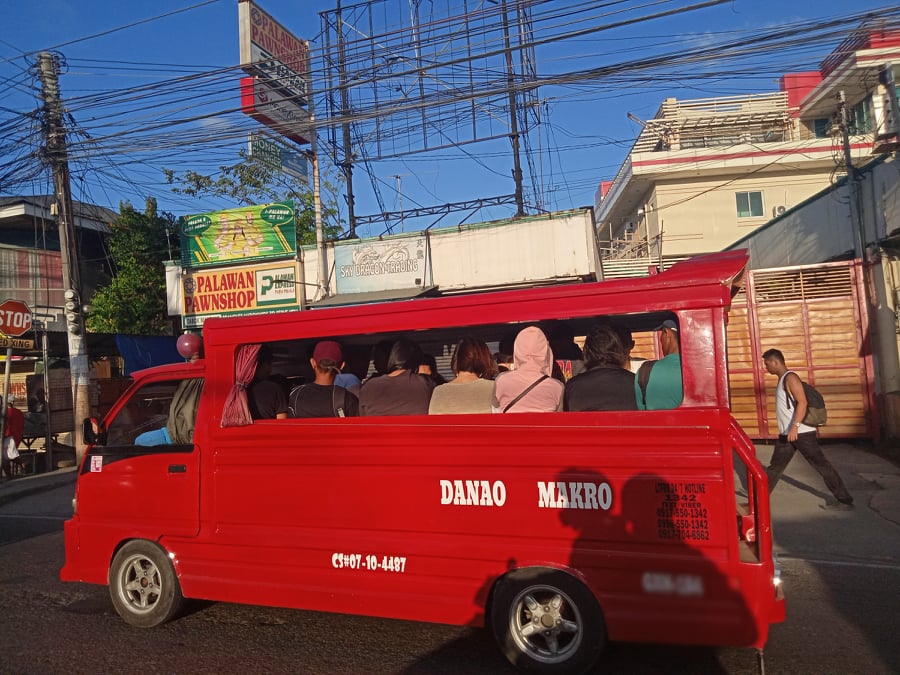 Jeepney with passengers