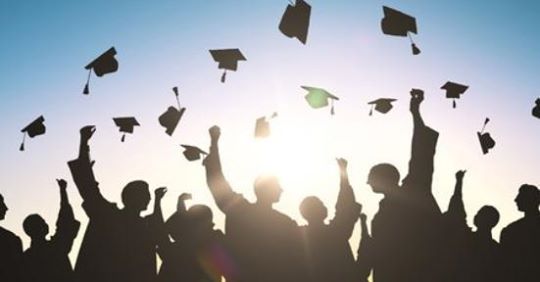 DEPED CEBU CITY WAITING FOR APPLICATIONS FOR PHYSICAL GRADUATION. In photo are students celebrating after graduation rites. | stock photo