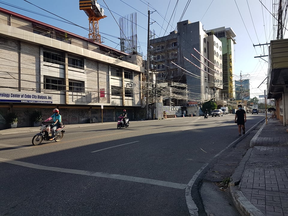 The once busy corner of Escario Street and Gorordo Avenue is just an empty street a week after the ECQ was implemented in Cebu City. | Alven Marie A. Timtim
