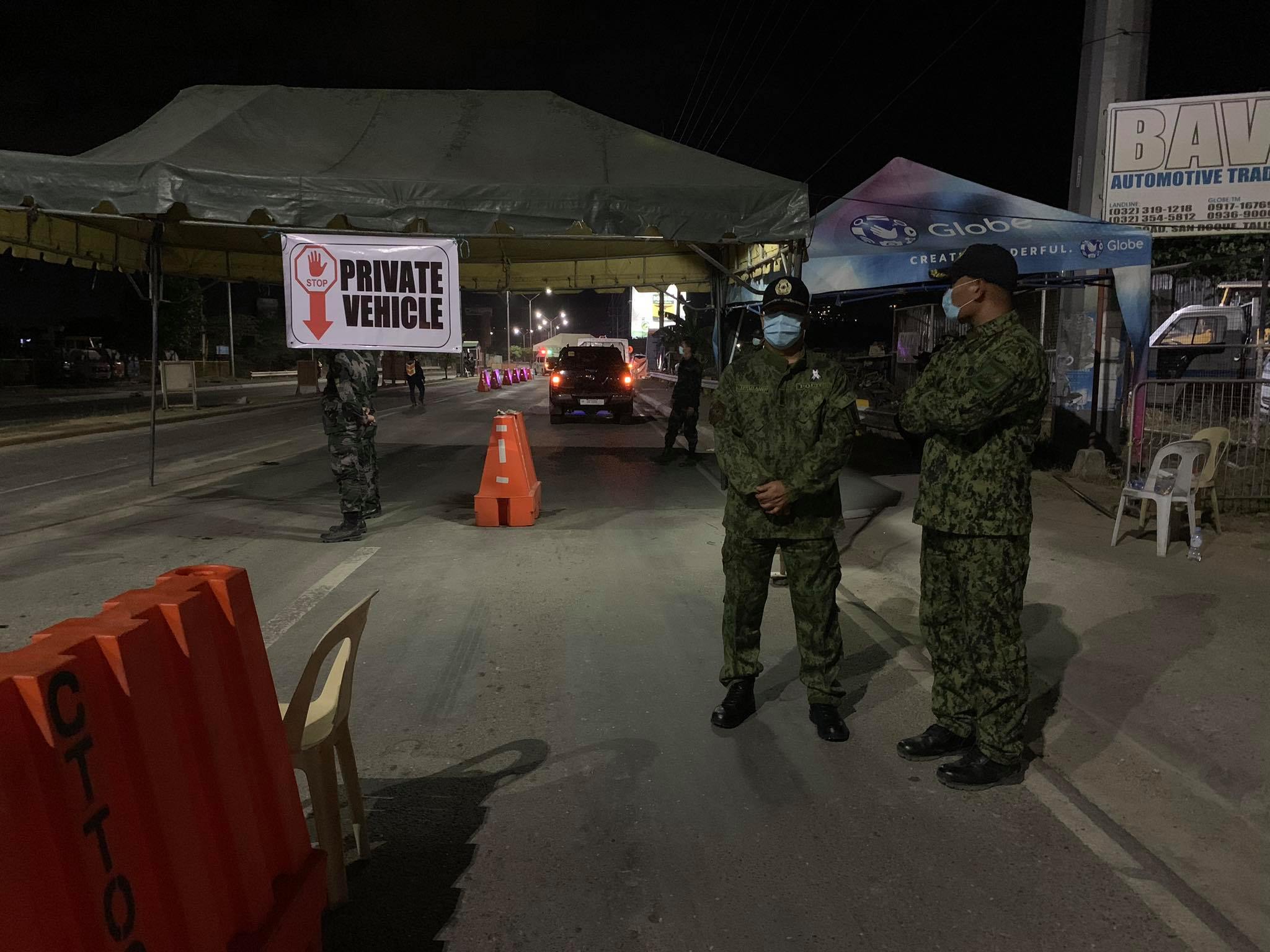 Talisay City policemen man the border checkpoint or the border control point of Talisay City and Cebu City. | file photo