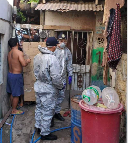 Police conduct a foot patrol in Sitio Zapatera, Barangay Luz in Cebu City on April 12, 2020 to ensure that lockdown rules are being followed. For Dr. Daisy Villa, City Health Officer, she appeals to the mayor not to use the public high school of the barangay to isolate asymptomatic COVID-19 patients of Sitio Zapatera.  | CCPO photo