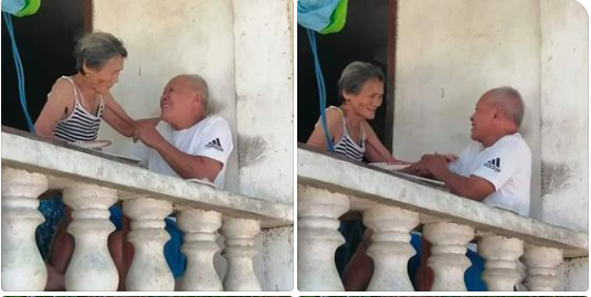 Tatay Numeriano and Nanay Remedios, a senior citizen couple, playing around after running around their yard on April 18. | Pauline Limbagan.