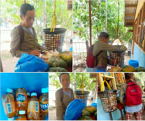 Tatay Juanito, a farmer, buying some food to share with his neighbors after receiving his cash assistance on April 20, in Bayawan City, Negros Oriental. | Cherry Elusfa Baya.