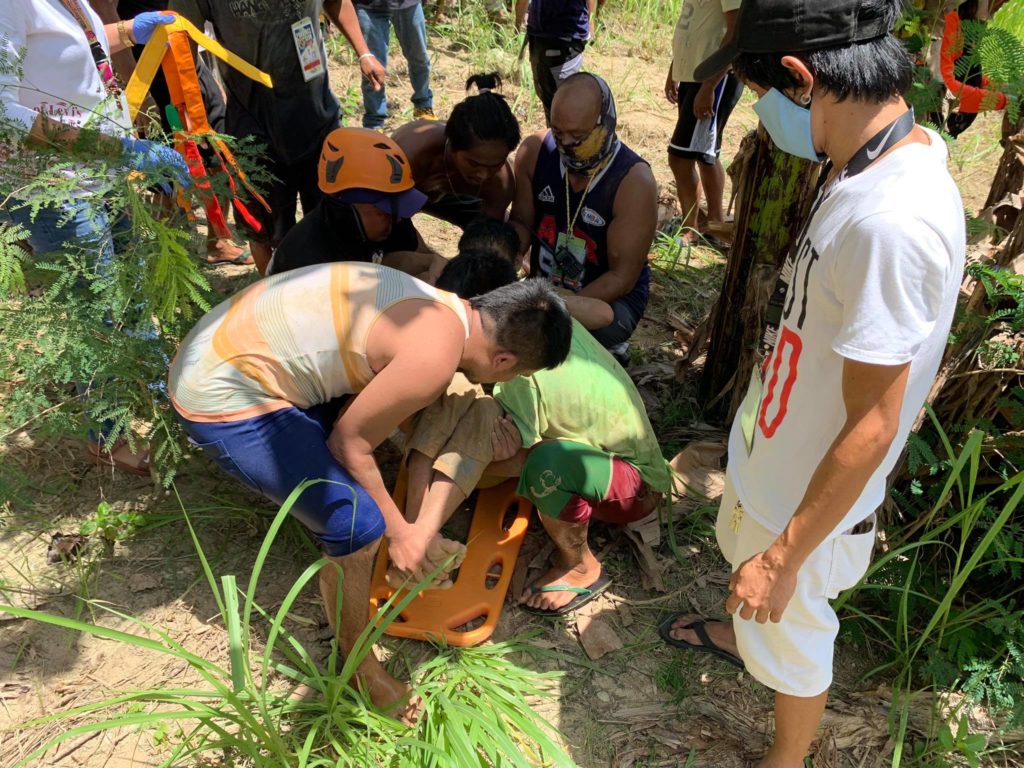A 48-year-old man and his three children were rescued by the Dumanjug emergency response team after they were buried in a sand due to a mini landslide in Barangay Tapon, Dumanjug, Cebu Saturday morning, May 2, 2020. | Photo from Dumanjug Police