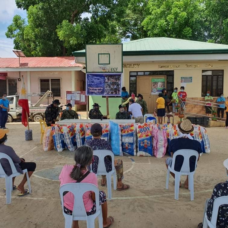 At least 270 families in Barangay Kampingganon, Bantayan town, Cebu, receive relief packs from Cebu Police Provincial Office (CPPO) on May 16, 2020. | Photo from CPPO