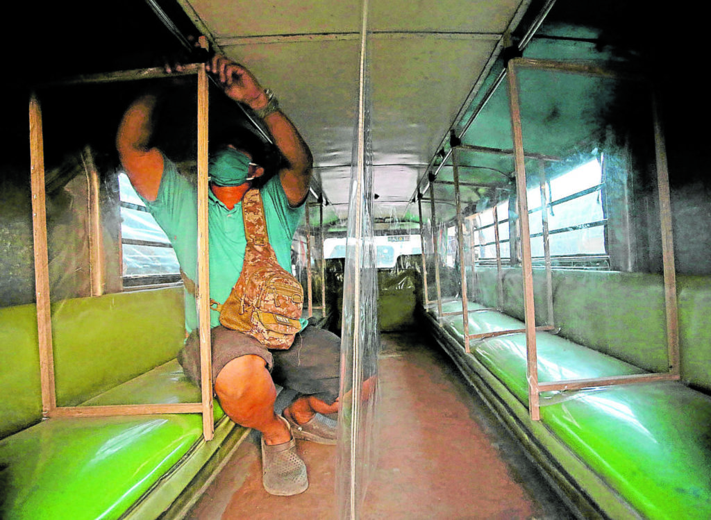 Out-of-work driver preps jeepneys for social distancing - INQUIRER.net