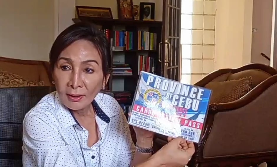 Cebu Governor Gwendolyn Garcia shows a sample of the Cargo Vehicle Pass that the Capitol will issue to cargo delivery vehicles as a requirement for them to pass through the province's border controls with Cebu City. | Rosalie O. Abatayo
