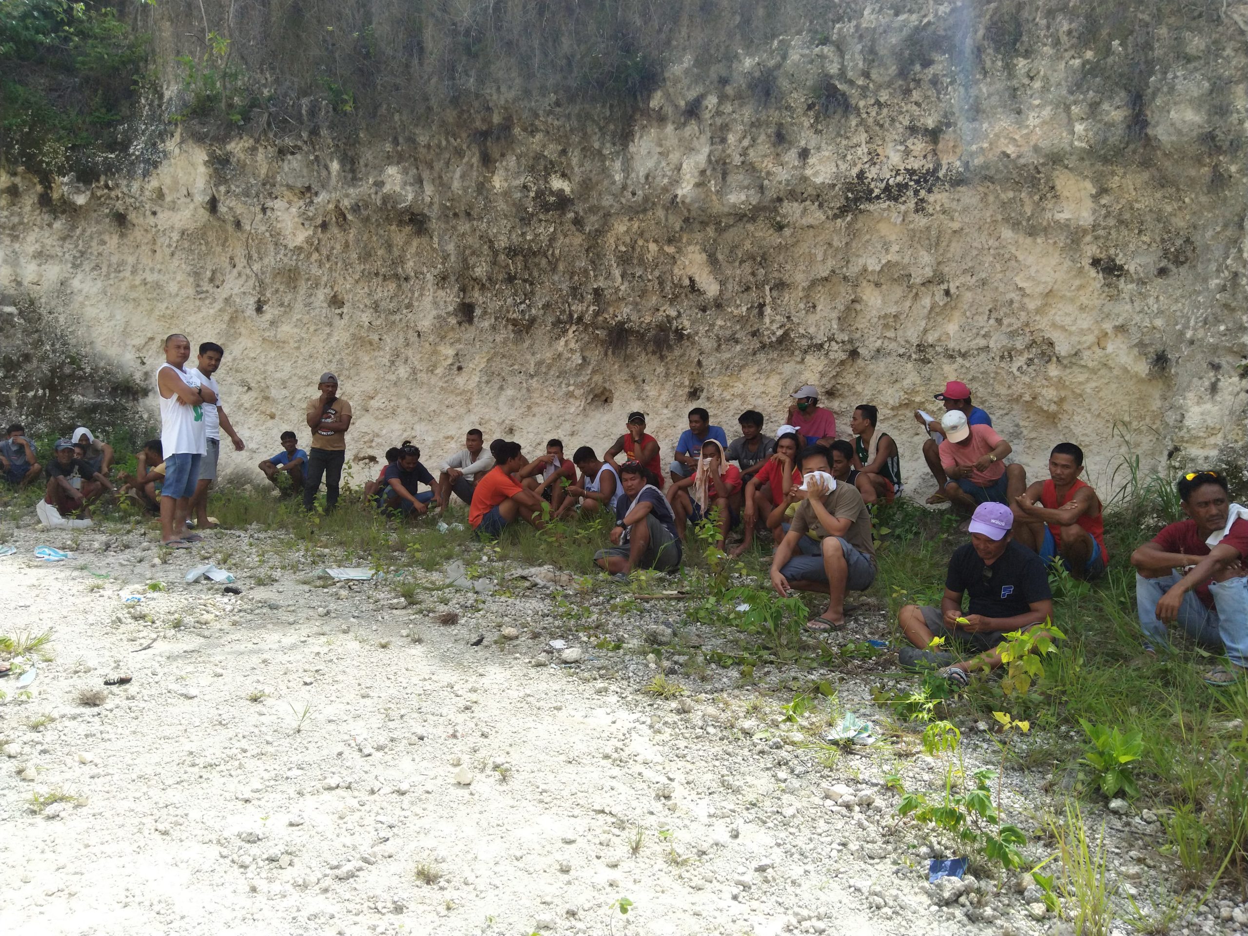 The First Provincial Mobile Force Company arrest 53 men caught engaging in illegal cockfighting activity or tigbakay on Saturday, June 29, 2020 in Sitio esi, Barangay Kal-anan, Tabogon, Cebu.| CONTRIBUTED PHOTO -- Police Lt. Col. Randy Korret